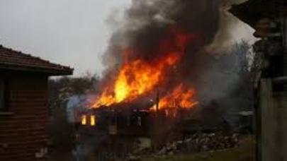 Yanan evin sahibinin asılmış cəsədi tapıldı